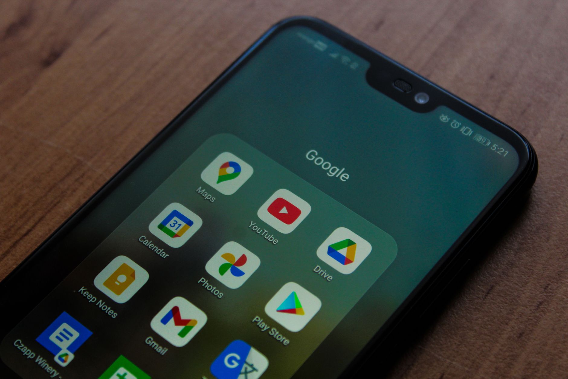 pexels-photo-10774600 a black android smartphone with google apps on screen